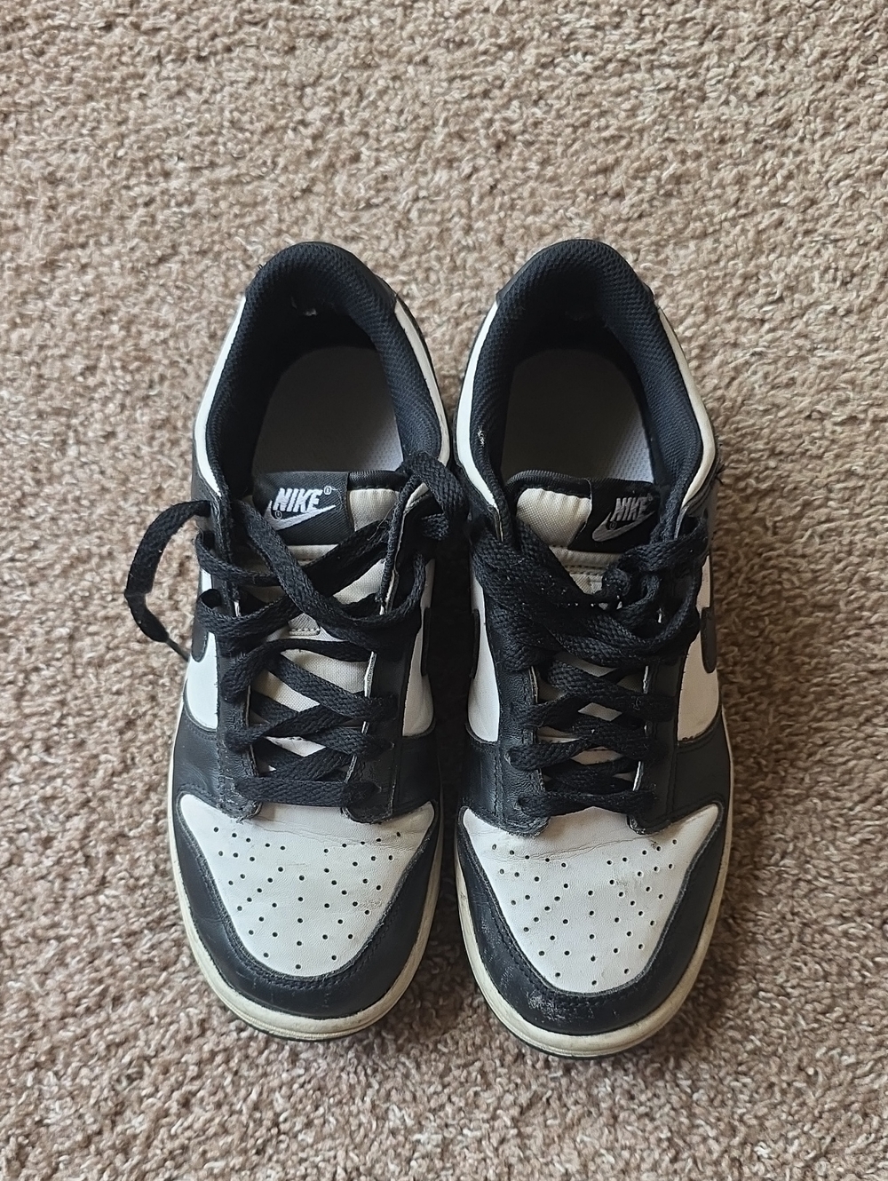 Nike Black and White Low-Top SneakersNike Dunk Low "Panda" in a youth size 6.5Y.